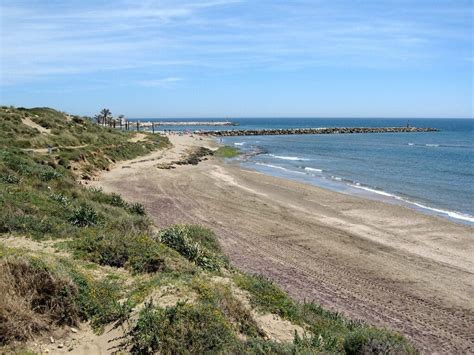 playa guadalmar naturista|Diez playas nudistas que no puedes perderte en。